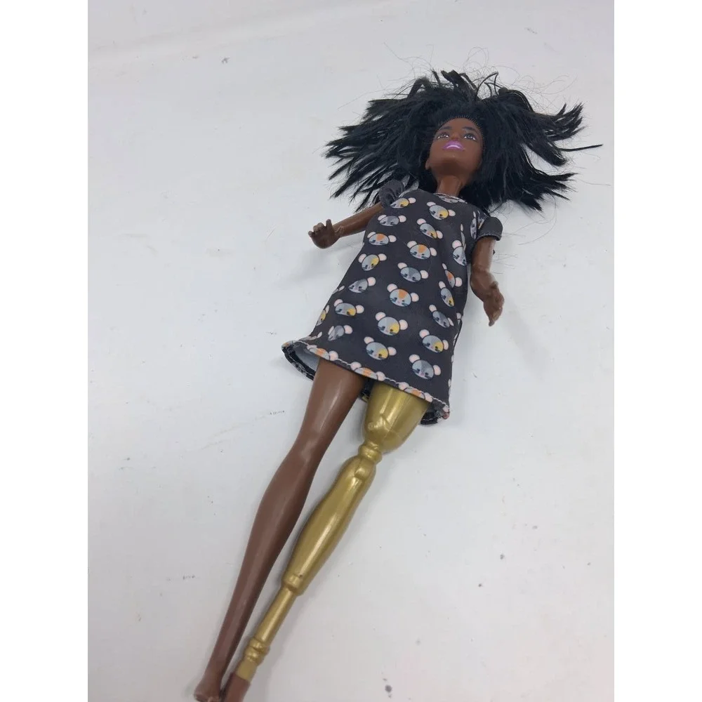 mattel 2014 african american doll with prosthetic leg. U